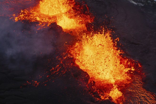 A volcano erupts in southwestern Iceland and spews magma in a spectacular show of Earth's power