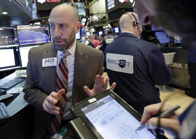Markets Right Now: Dow ends turbulent day up 567 points