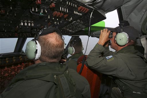 Australia says planes checking new search area