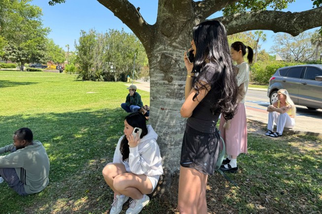 Florida State gunman used deputy mom's former service weapon to kill 2 and wound 6, authorities say