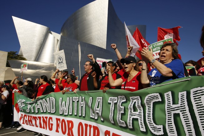 Thousands of teachers march in Los Angeles as strike looms