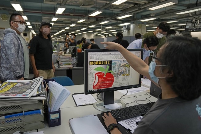 Hong Kong newspaper increases print run after arrests