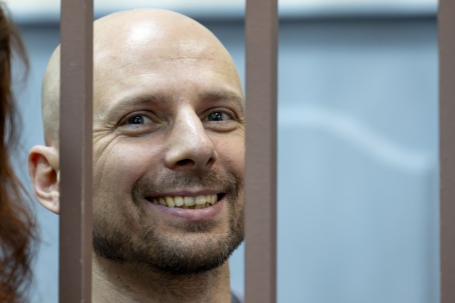Prosecutors ask for nearly 6-year sentences for Russian journalists in Moscow trial