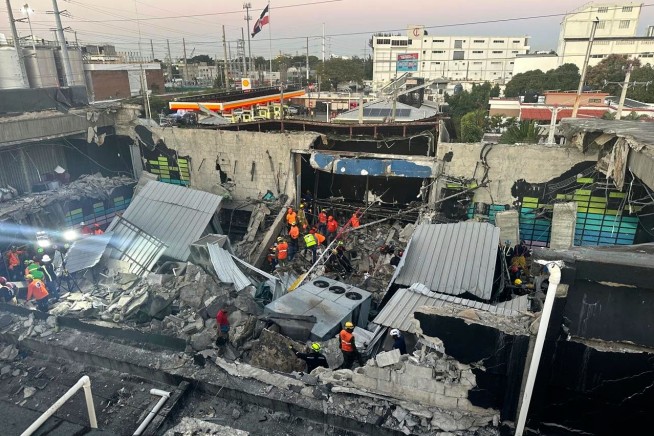 The roof collapses at a Dominican Republic nightclub, killing at least 98 people