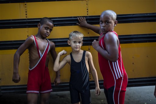 AP Photos: Children learn wrestling in Old Havana