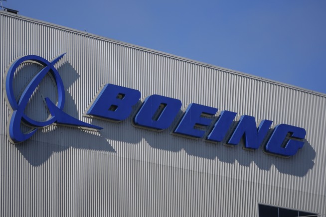 Boeing lays off hundreds in Washington and California as part of cuts announced previously