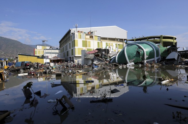 Warning system delays add to deaths in Indonesian tsunami