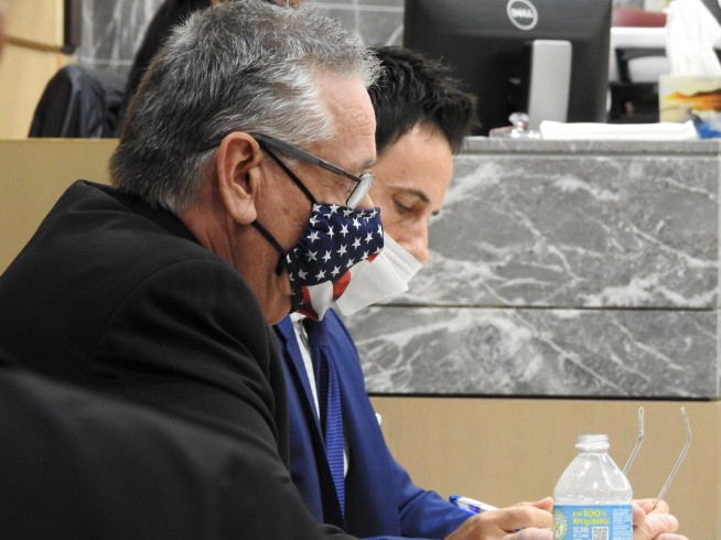 Judge: School officer who hid during shooting facing charges