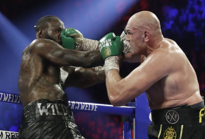 Wilder says pre-fight costume wore him down before Fury did