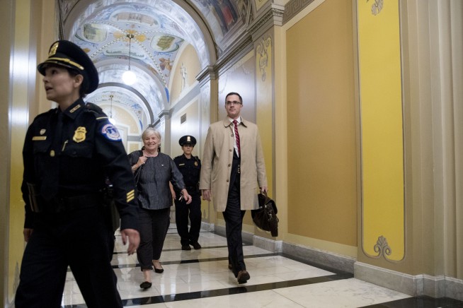 Ex-Trump aide confirms Biden probe sought, says not illegal