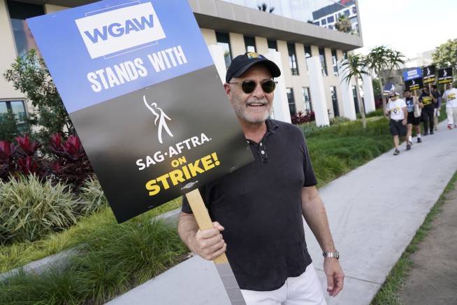 Hollywood writers vote to approve contract deal that ended strike as actors negotiate