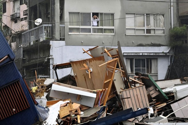 At least 19 missing as mudslide west of Tokyo hits houses