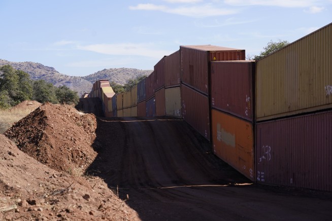 Arizona Gov. Ducey stacks containers on border at term's end