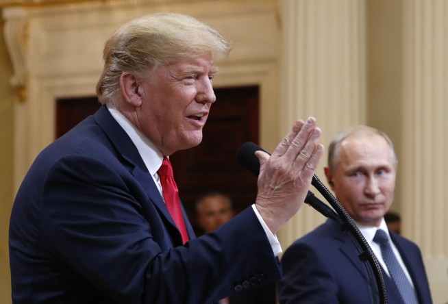 The Latest: Trump says he misspoke on Russia meddling
