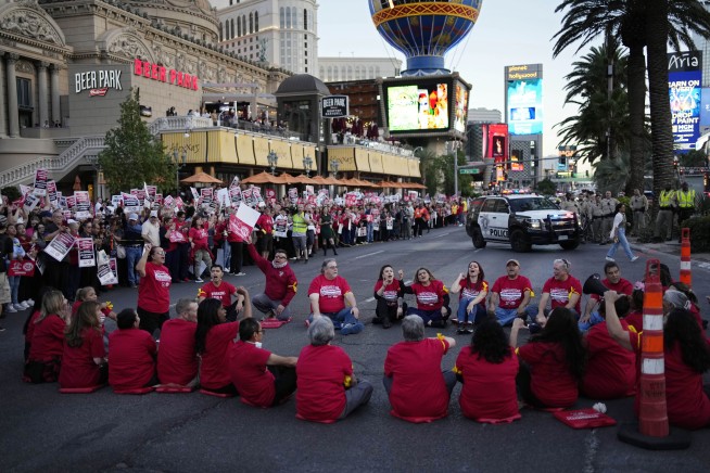 Dozens of union workers arrested on Las Vegas Strip for blocking traffic as thousands rally