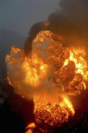 Train carrying 3 million gallons of crude still burning