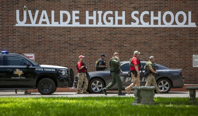 Onlookers urged police to charge into Texas school