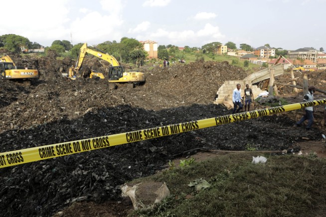 Death toll in Uganda rubbish heap collapse reaches 24 as rescue teams find more victims