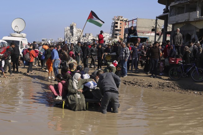 Palestinians celebrate their return to northern Gaza after 15 months of war
