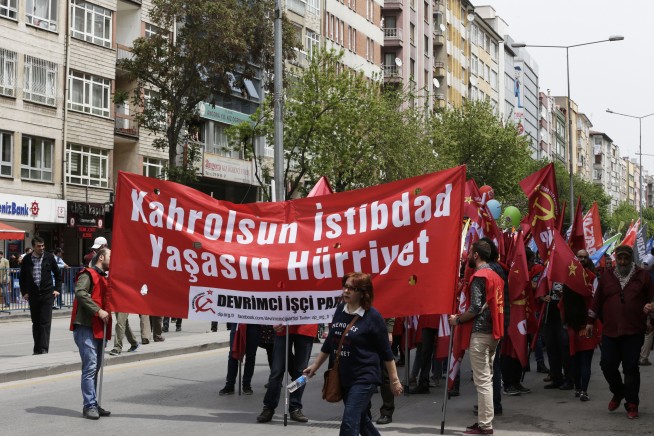 The Latest: Paris police, protesters clash at May Day march