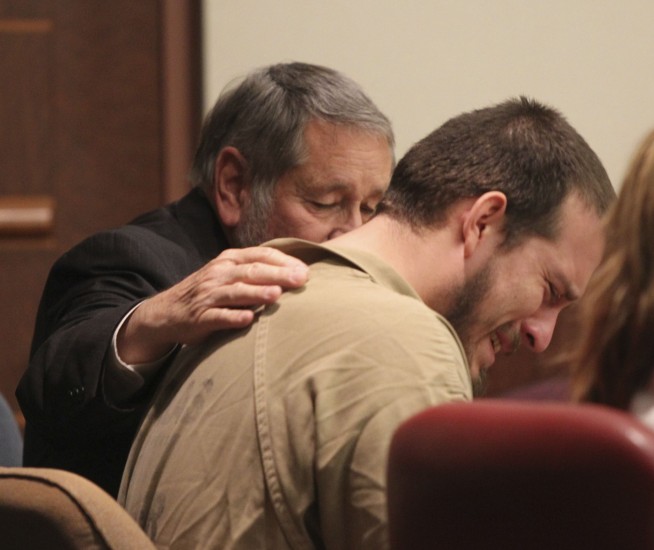 Prison for 2 who threatened violence at black child's party