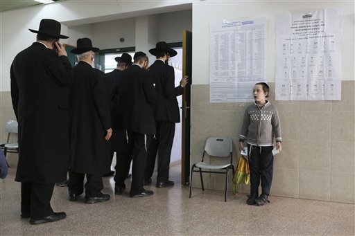 As Israel votes, Netanyahu takes swipe at Arabs