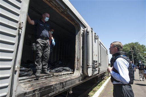 Rebels release train with bodies from downed jet