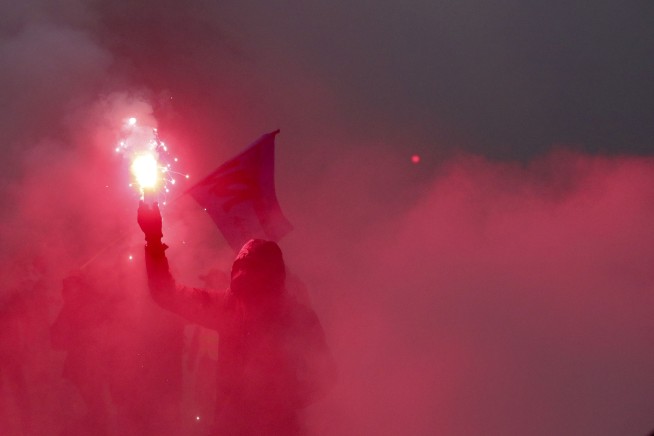 Paris police use tear gas amid strike over pension reform