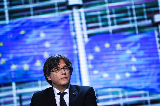 Detained Catalan leader sought by Spain awaits fate in Italy