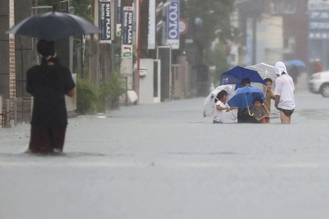 Heavy rain causes floods, mudslides in southwestern Japan