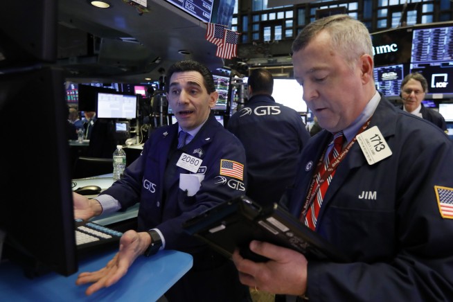 Markets Right Now: Stocks end a wobbly day slightly lower