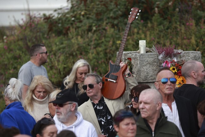 Mourners in Ireland pay their respects to singer Sinéad O'Connor at funeral procession