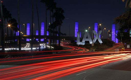 AP Exclusive: LAX gunfire came while officers away