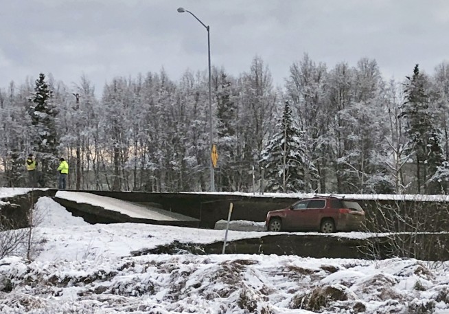 Powerful quakes buckle Alaska roads, trigger tsunami warning