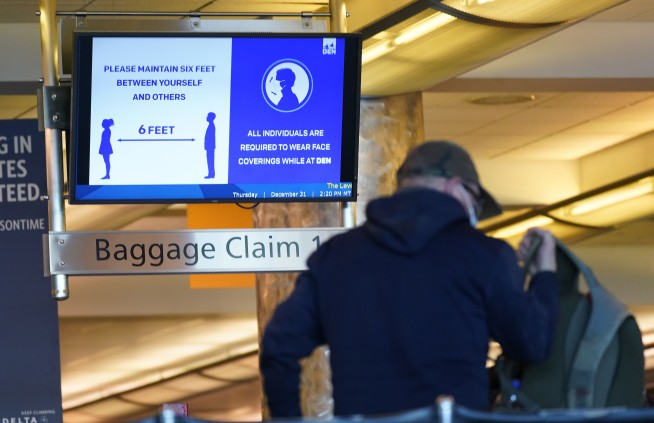 What's safe after COVID-19 vaccination? Don't shed masks yet