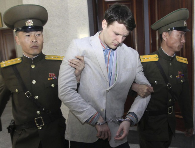US college student released by North Korea home, but in coma