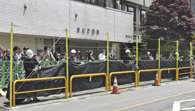 No more cute snaps of Mount Fuji over a convenience store. A screen was built to stop tourist crowds