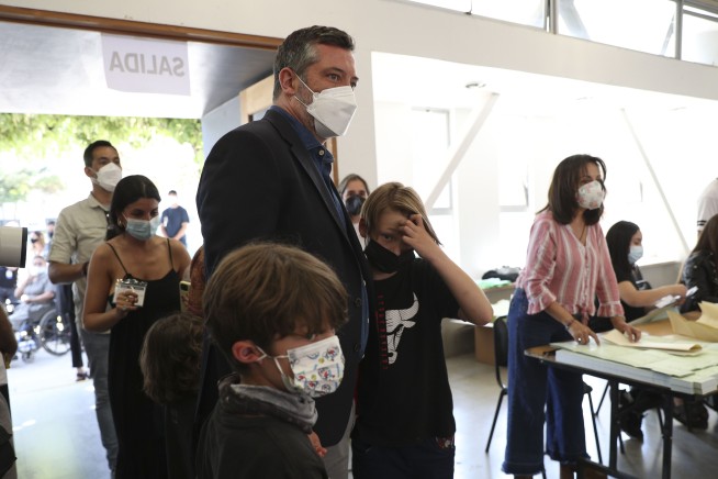 Chileans vote in highly polarized presidential election