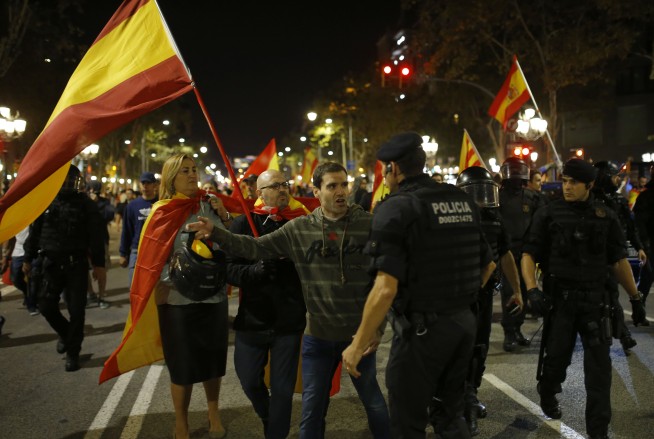 The Latest: Catalan leader calls for peaceful protests