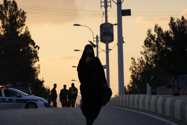 Islamic State group claims responsibility for Iran suicide bombings killing at least 84 people