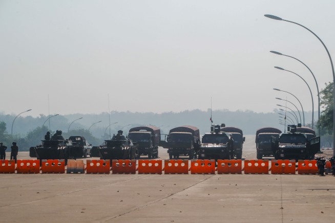People in Myanmar honk horns, bang on pots to protest coup