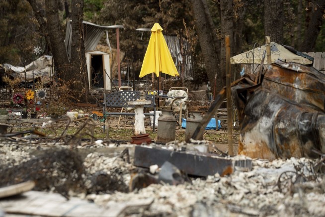 Residents head back into California town leveled by wildfire