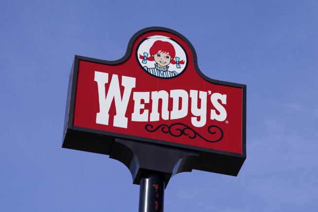 Wendy's says it has no plans to raise prices during the busiest times at its restaurants
