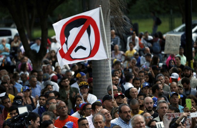 The Latest: Allies say Venezuelan oppos'n figures taken away