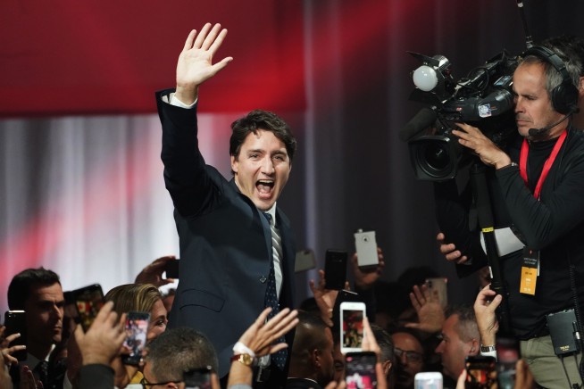 Canada's Trudeau wins 2nd term but loses majority