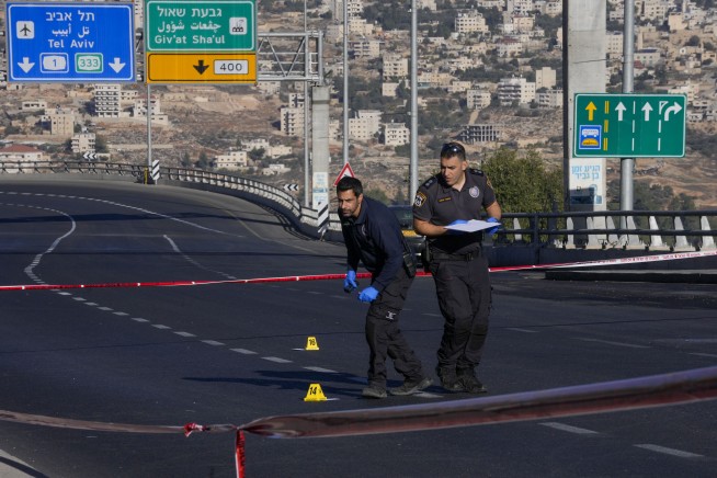 Twin blasts shake Jerusalem, killing teen and wounding 18