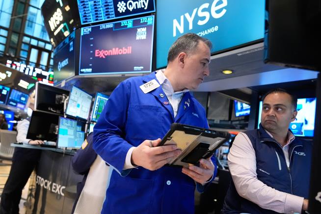 US stocks swing through another shaky day as oil prices keep climbing