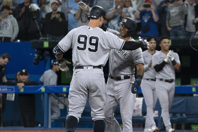 Judge ties Maris AL mark with 61st HR, lifts Yanks over Jays