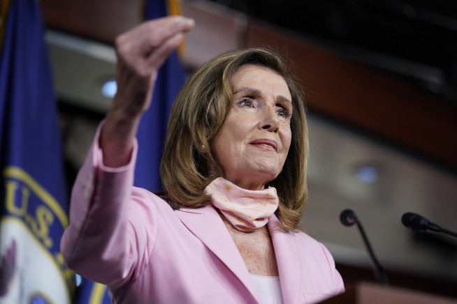 'Ignore' Trump, Pelosi says, as House debates postal funds