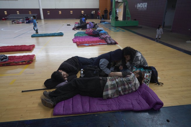 Rain from Tropical Storm Hilary lashes California and Mexico, swamping roads and trapping cars